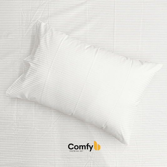 Elevate your bedding with Comfyb Stripes Poly Cotton 50/50 Fitted Sheet Sets, featuring a striped fitted sheet and pillowcases in soft tones. Crafted from a 50/50 poly-cotton blend, these sets require no ironing. Available in single (two 120×200+30 cm fitted sheets, two 50×75 cm pillowcases), double (180×200+30 cm fitted sheet, two 50×75 cm pillowcases), and king sizes (200×200+30 cm fitted sheet, two 50×75 cm pillowcases), each ensures a comfortable night's sleep.